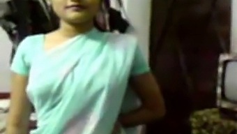 A Sensual Indian Girl In A Saree Entices (Recent)