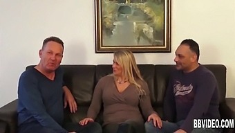A Well-Endowed German Mature Woman Handles Two Penises In A Threesome