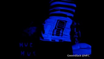 A Man'S Black Light-Enhanced Dance Moves Include His Buttocks