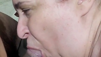 Middle-Aged Woman Gives A Blowjob To A Young Delivery Guy