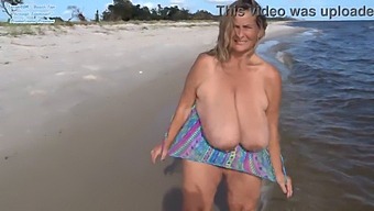 Curvy Mature With 40m Tits Shows Off On The Beach